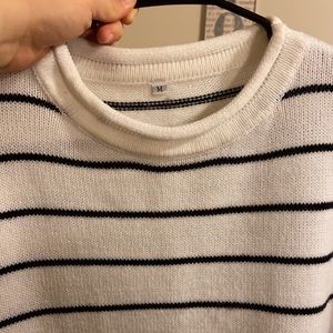 White and black sweater